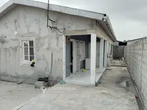 Photo - Parcelle avec maison - Ngoyo