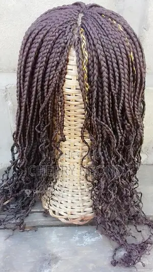 Photo - Perruque Afro 100% Naturelle - Coiffure Élégante