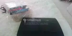 Photo - Console PlayStation 3 Slim - État neuf + 10 jeux offerts