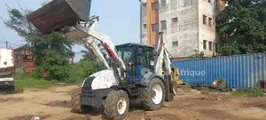 Photo - Tractopelle Terex 860 SE - Engin de chantier en bon état