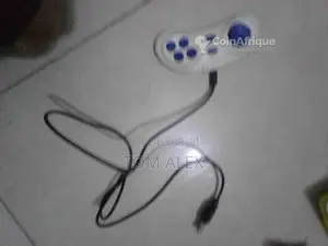 Photo - Manette de console Sega originale vintage