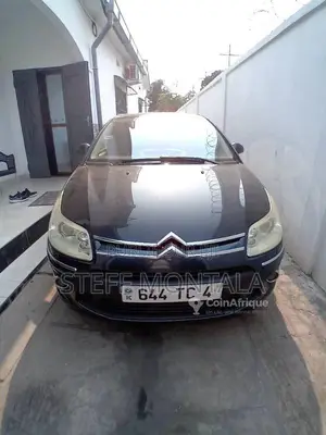 Photo - Citroën C4 2004 - Berline française essence, full options