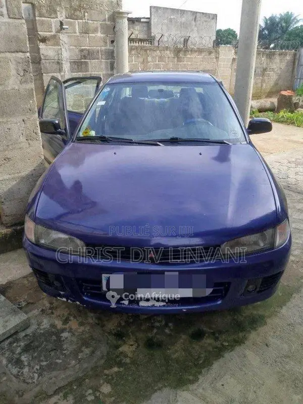 Mitsubishi Lancer 1999 - Berline manuelle essence