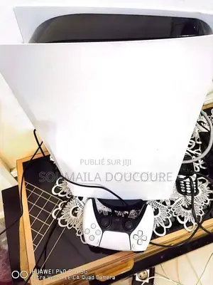Photo - Console PlayStation 5 en parfait état