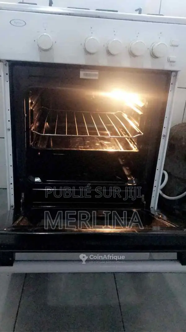 Cuisinière à gaz 4 feux avec four en bon état