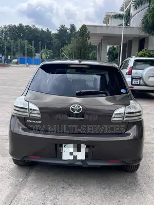 Photo - Toyota Lame 2006 Marron